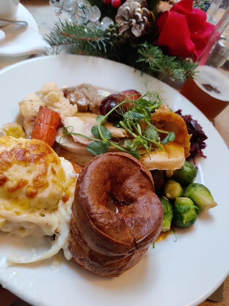 Sunday roast close up with beer in the background